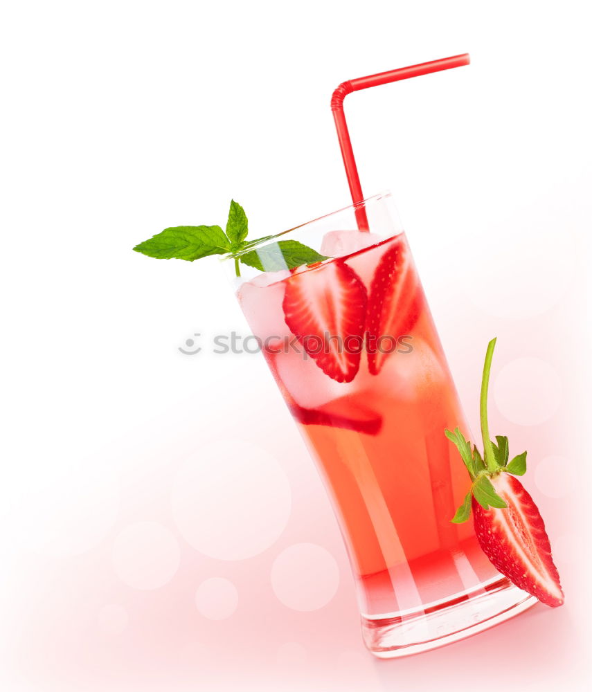 Similar – A glass of cool delicious soft drink with strawberry and currant on white background