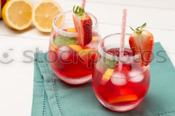 Similar – Image, Stock Photo Summer refreshment with orange and strawberries