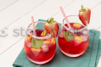 Similar – Image, Stock Photo Summer refreshment with orange and strawberries