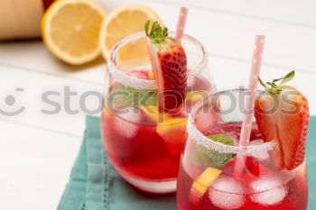 Similar – Image, Stock Photo Summer refreshment with orange and strawberries