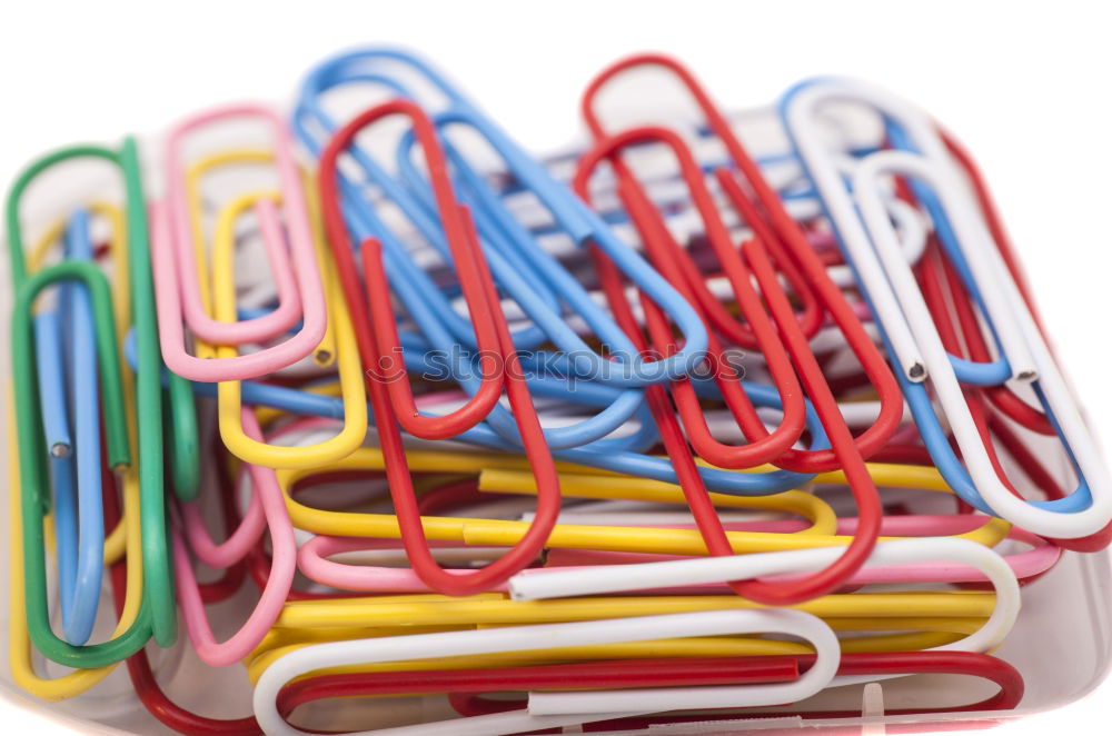 Similar – three coloured scissors in a round wire container in front of a yellow background