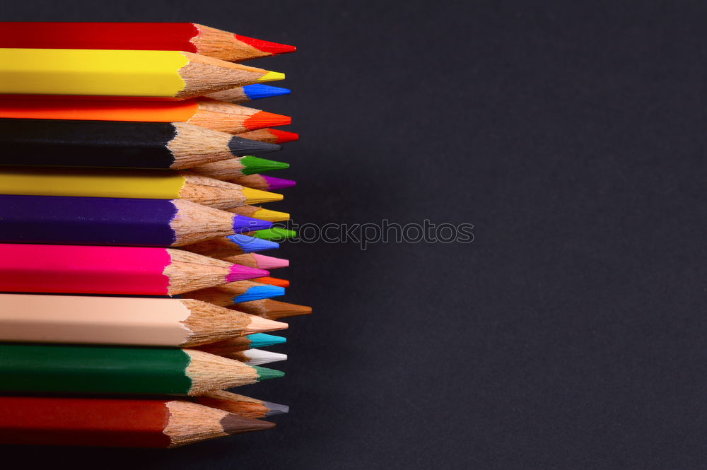 Similar – Pencil Mikado: yellow pencils with note