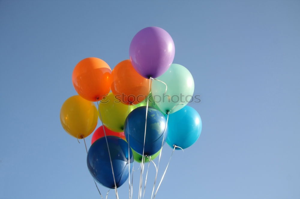 Similar – Aus Papier ausgeschnittene Luftballons schweben zwischen fluffigen Wolken durch den Himmel