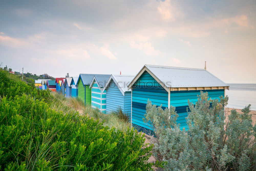 Similar – Colorful houses on piles