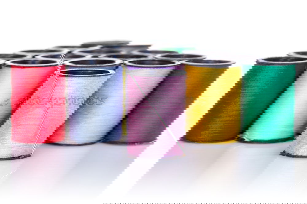 Similar – Image, Stock Photo Five old sewing thread thread rolls in pastel colours on wood