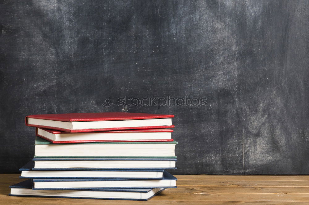 Similar – Education concept books on the desk in the auditorium