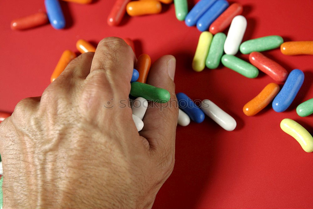 Similar – Hand and various pills on it. Human skin and medicines.