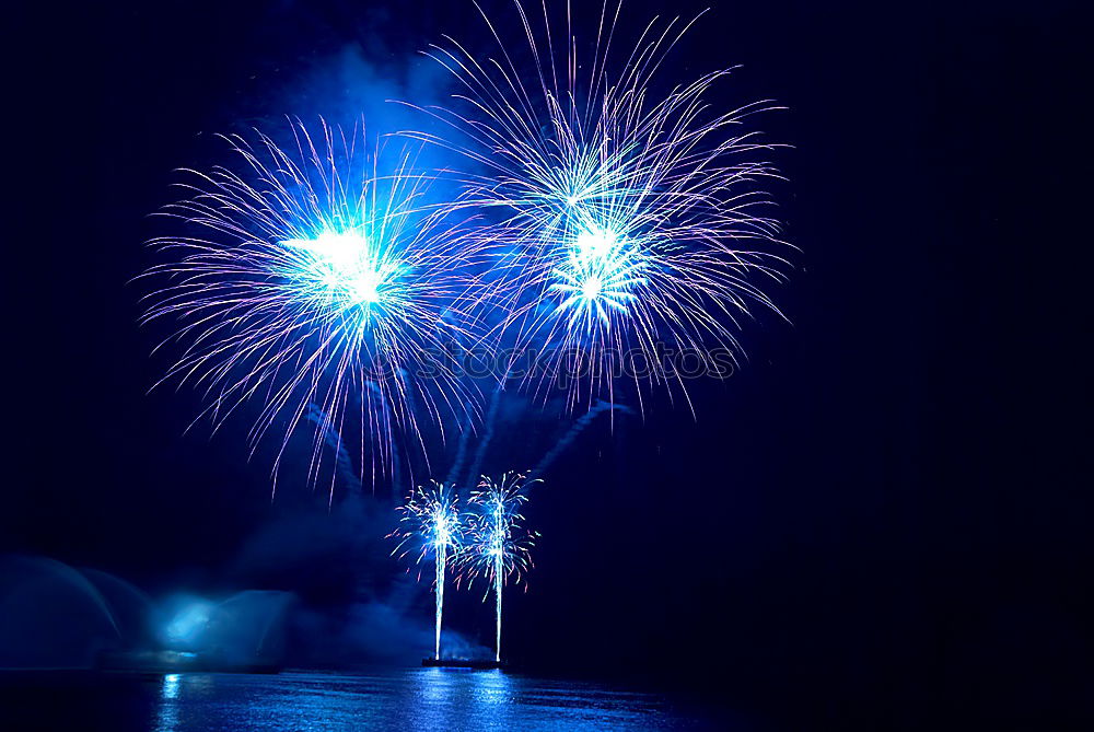 Similar – Image, Stock Photo Blue fireworks on the black sky