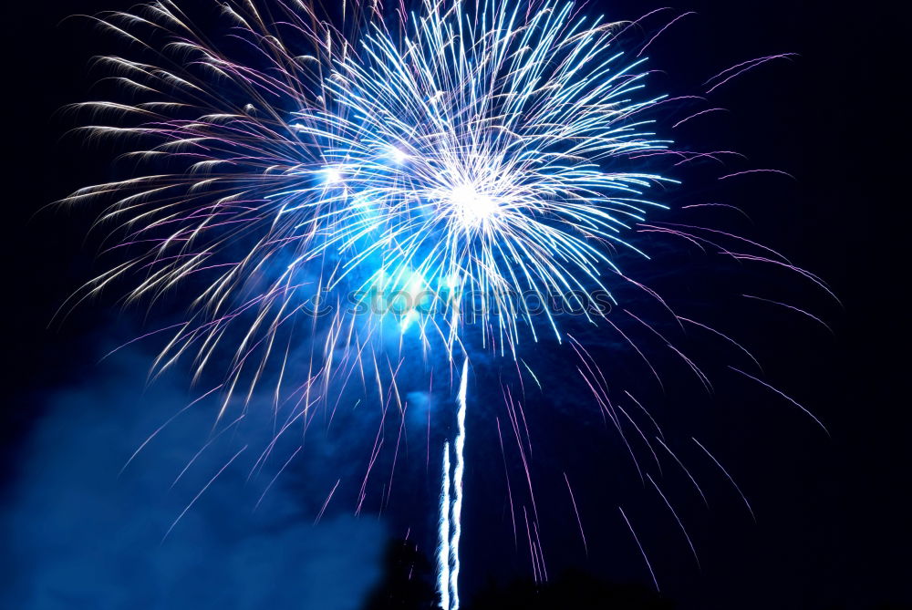 Similar – Blue fireworks with water reflection