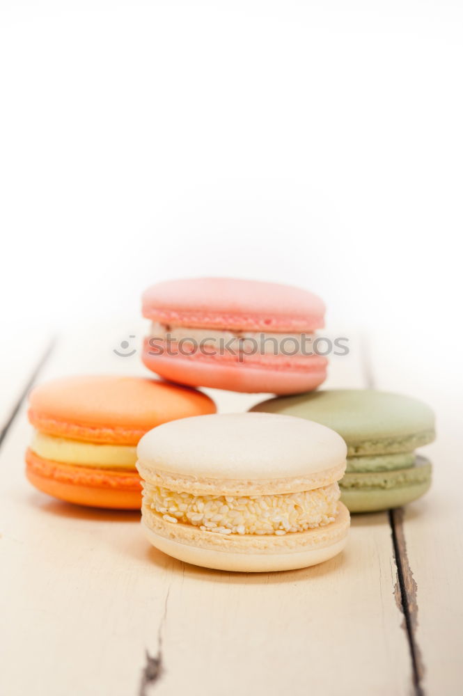 Similar – Image, Stock Photo Colorful macarons on white wooden table