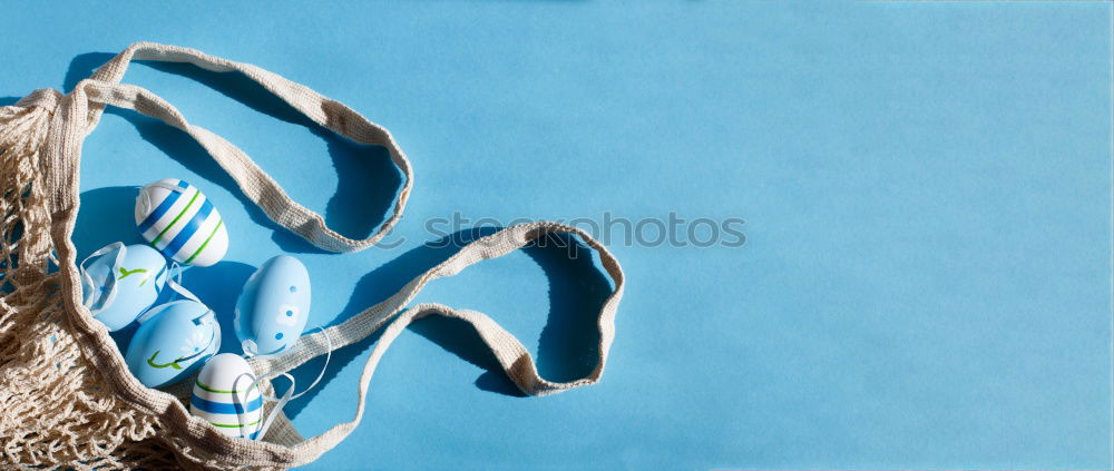 Similar – Image, Stock Photo Handmade brown stitched toy heart with cut out on blue felt