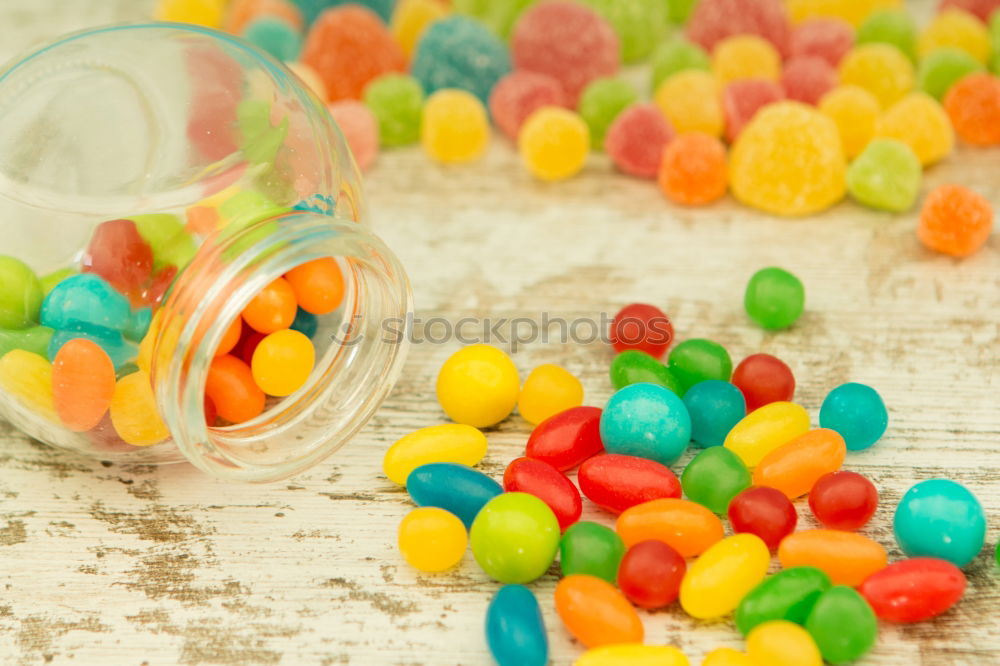 Similar – Image, Stock Photo Colorful jelly beans of different sizes close to wallpaper