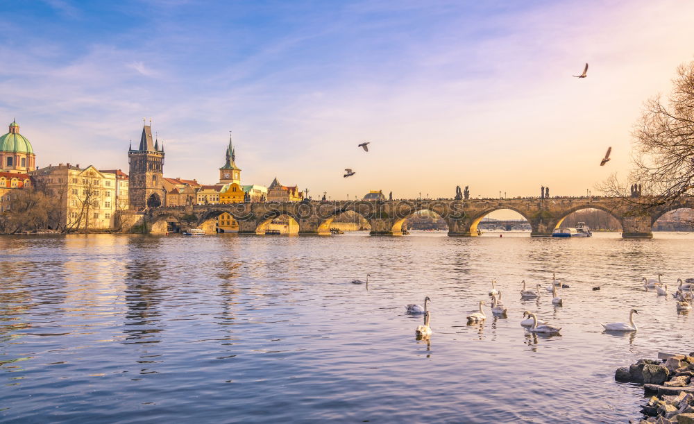 Prague city and Vltava river at sunset