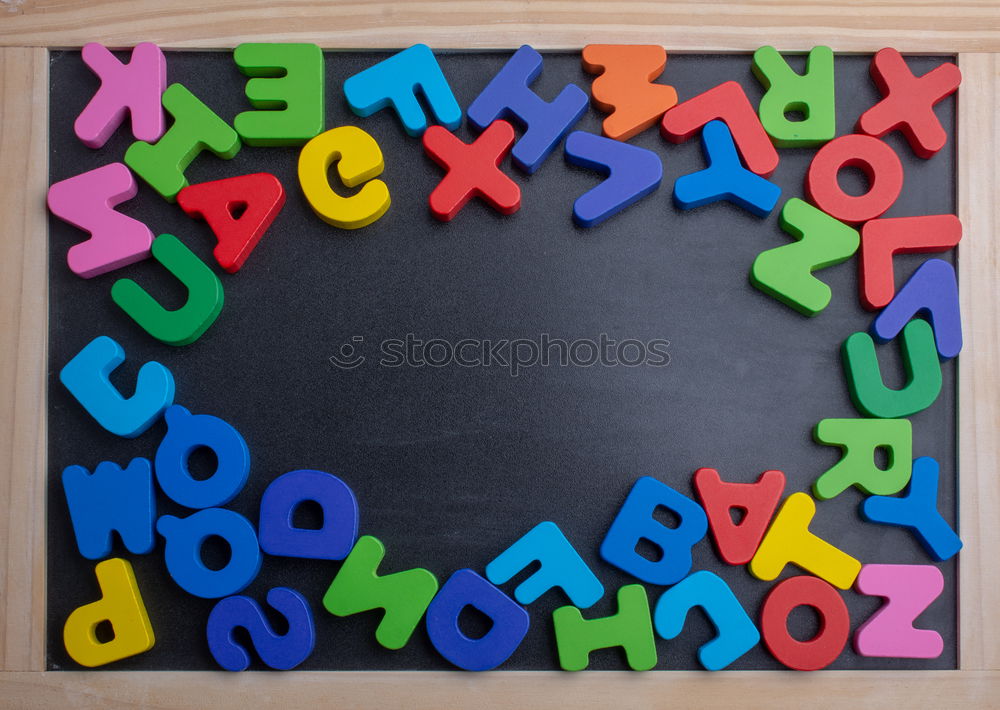 Similar – Wooden letters on wooden board