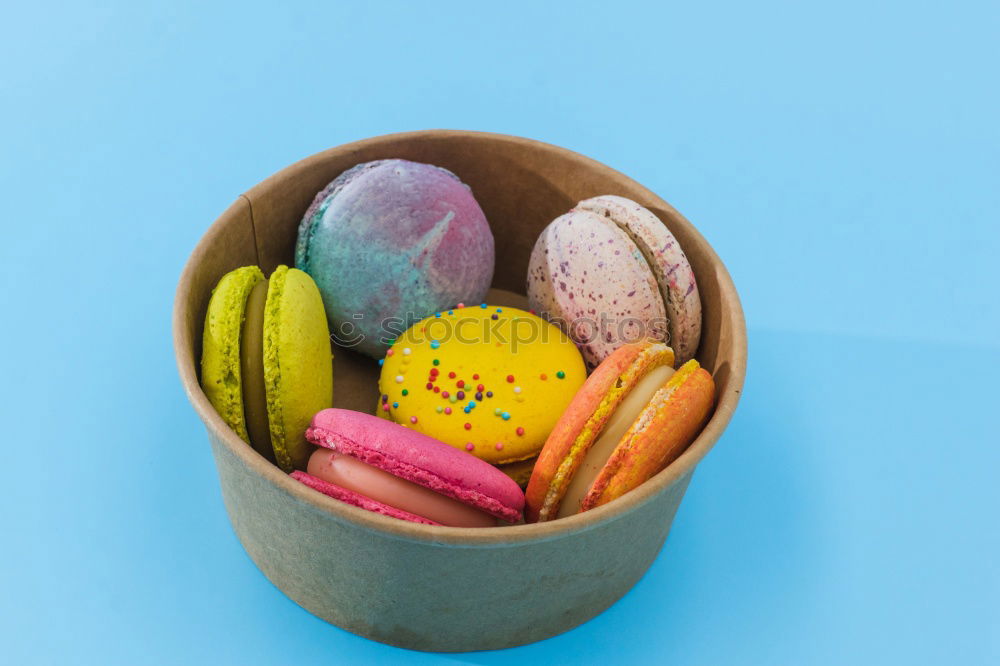 Almond biscuit macaron in a mug