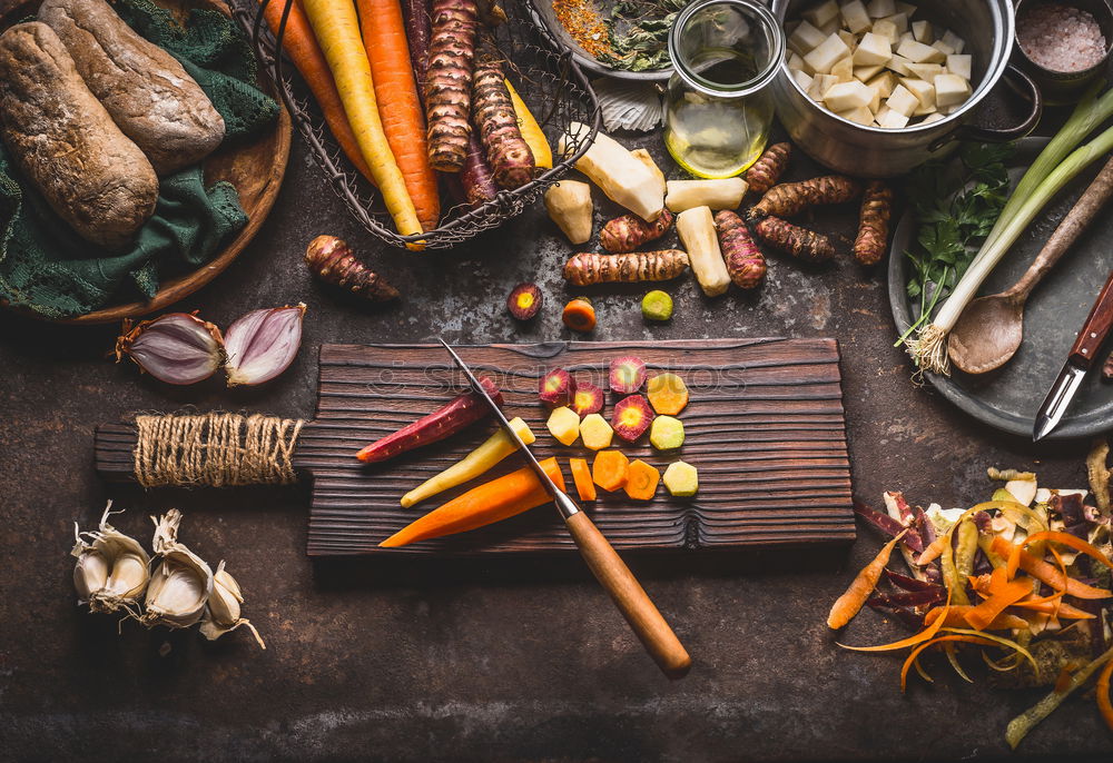 Similar – Sliced pumpkin on the kitchen table with cooking ingredients