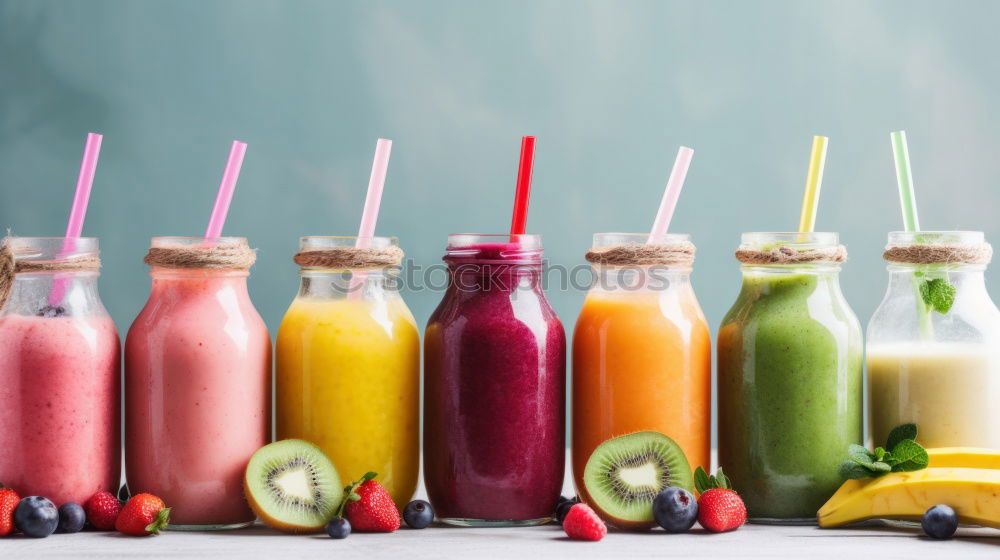 Similar – Colourful smoothies or juices in bottles with fresh ingredients