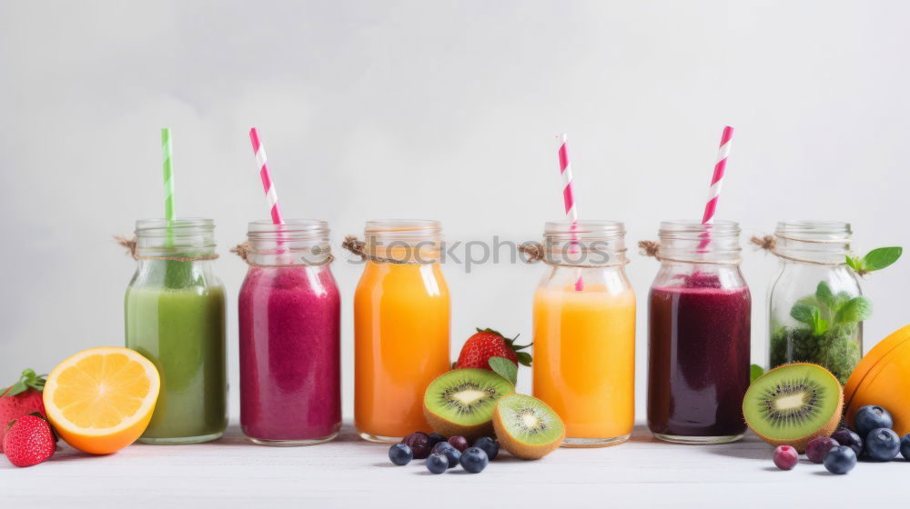 Similar – Colourful smoothies or juices in bottles with fresh ingredients