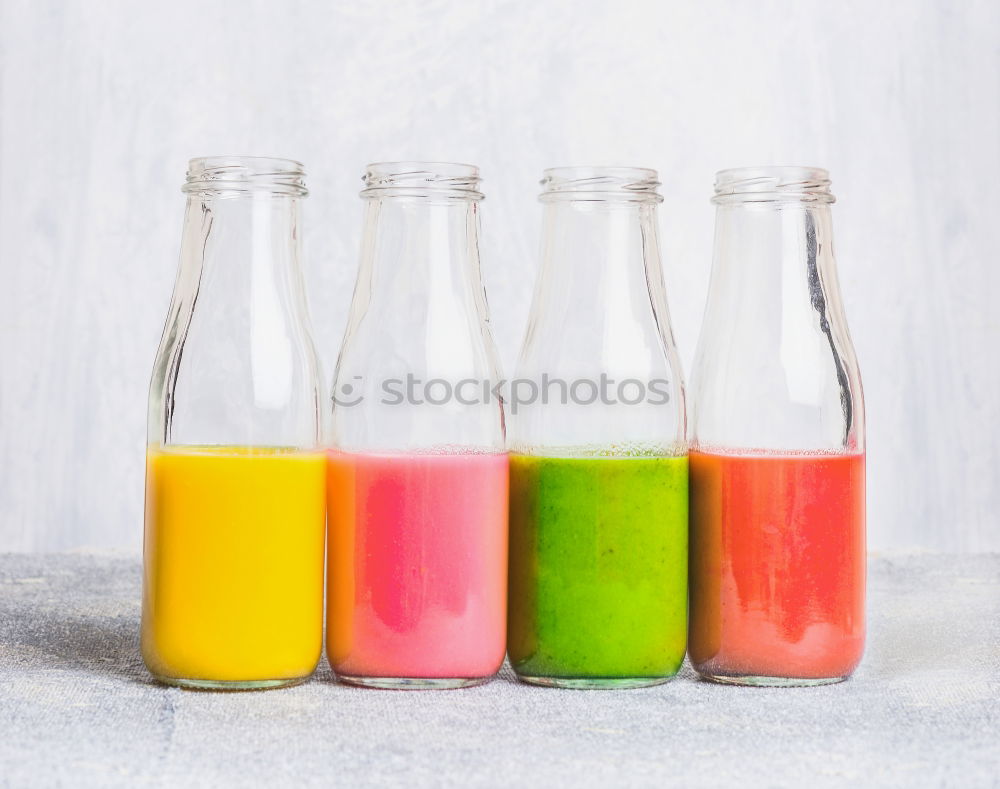 Similar – Image, Stock Photo Green and red juice in flashs