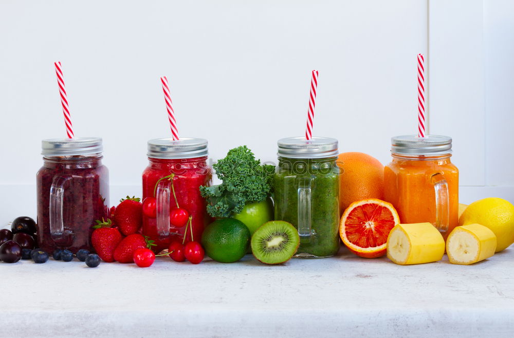 Similar – Image, Stock Photo Green and red juice in flashs