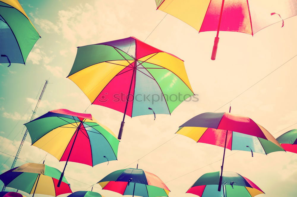 Similar – Image, Stock Photo umbrellas pink sky white clouds