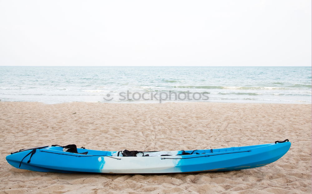 Similar – colorful Pedalos on the beach sand