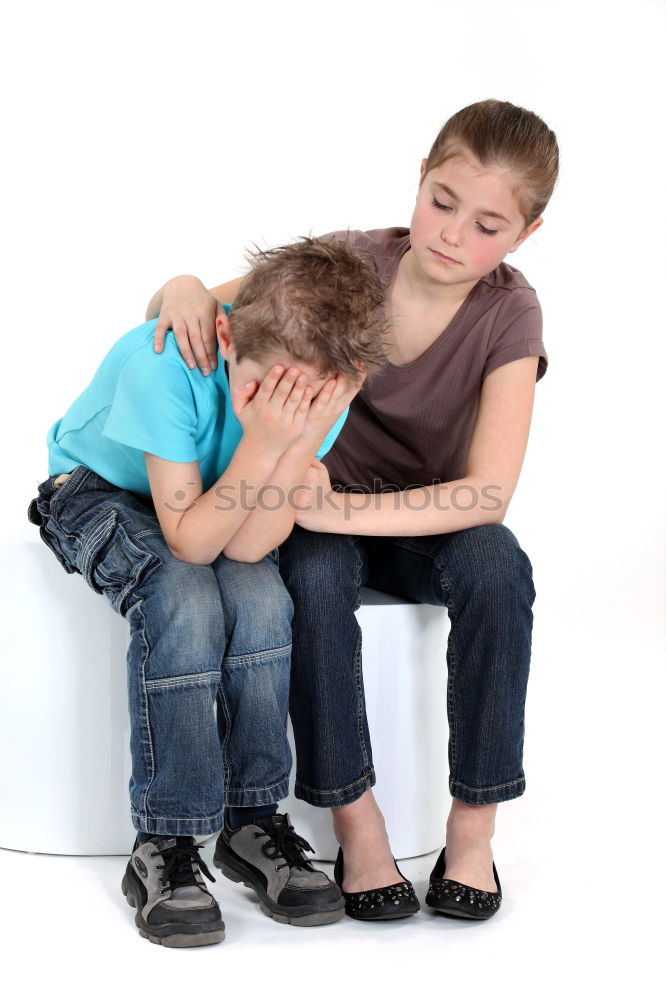 Similar – sad son hugging his mother at home. Concept of couple family is in sorrow.