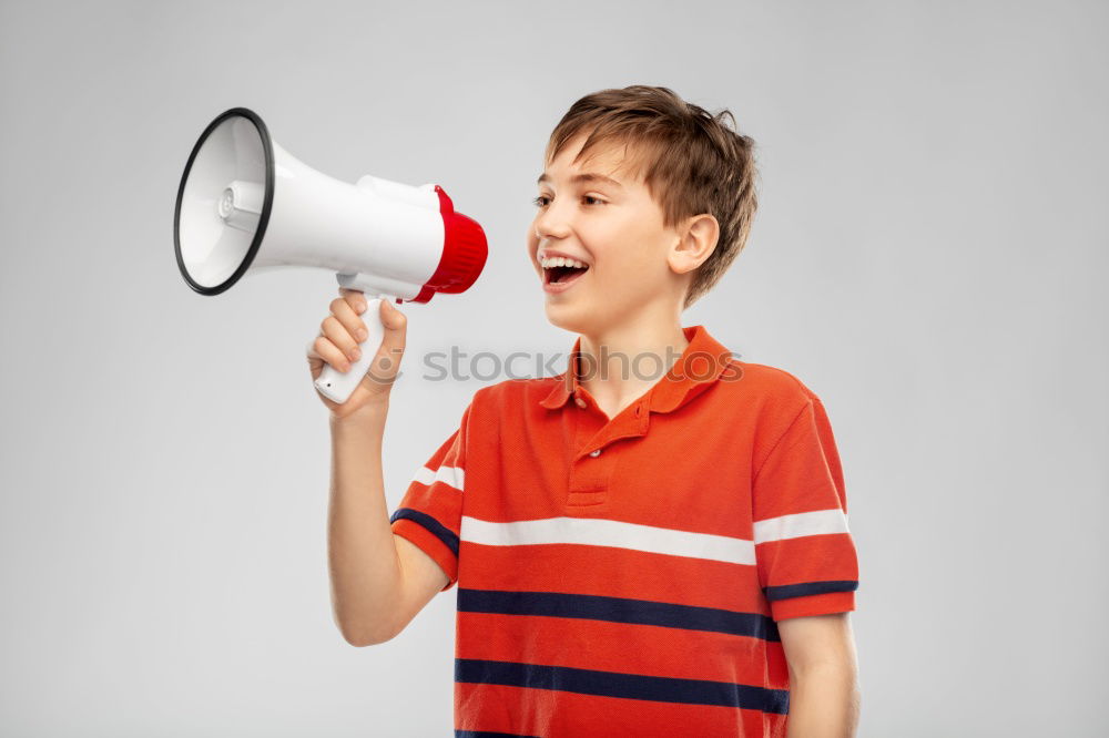 Similar – Image, Stock Photo Boy holding a sign on blue background