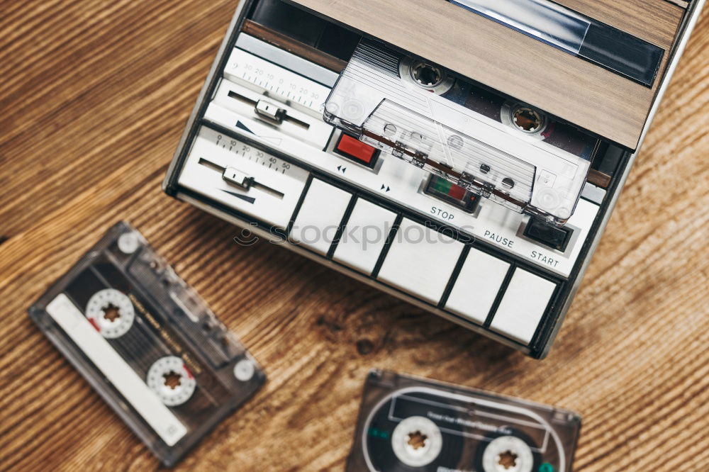 Similar – Vintage headphones and audio cassette