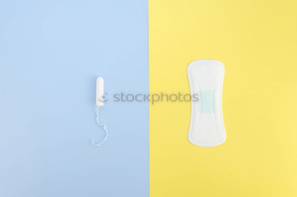 Image, Stock Photo white feather on blue and pink background