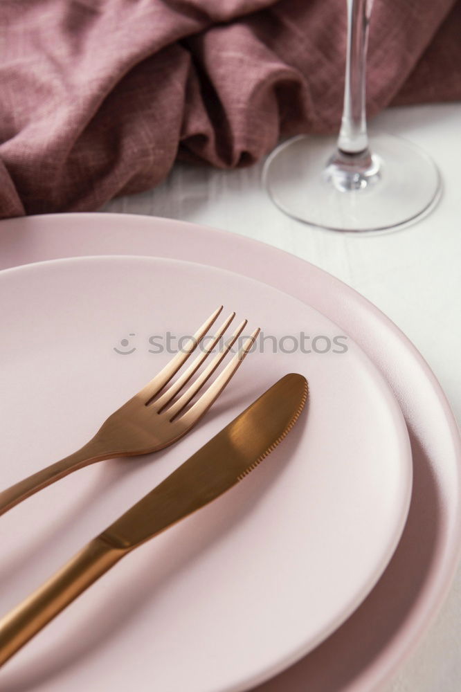 Similar – White empty plate and metal vintage knife and fork