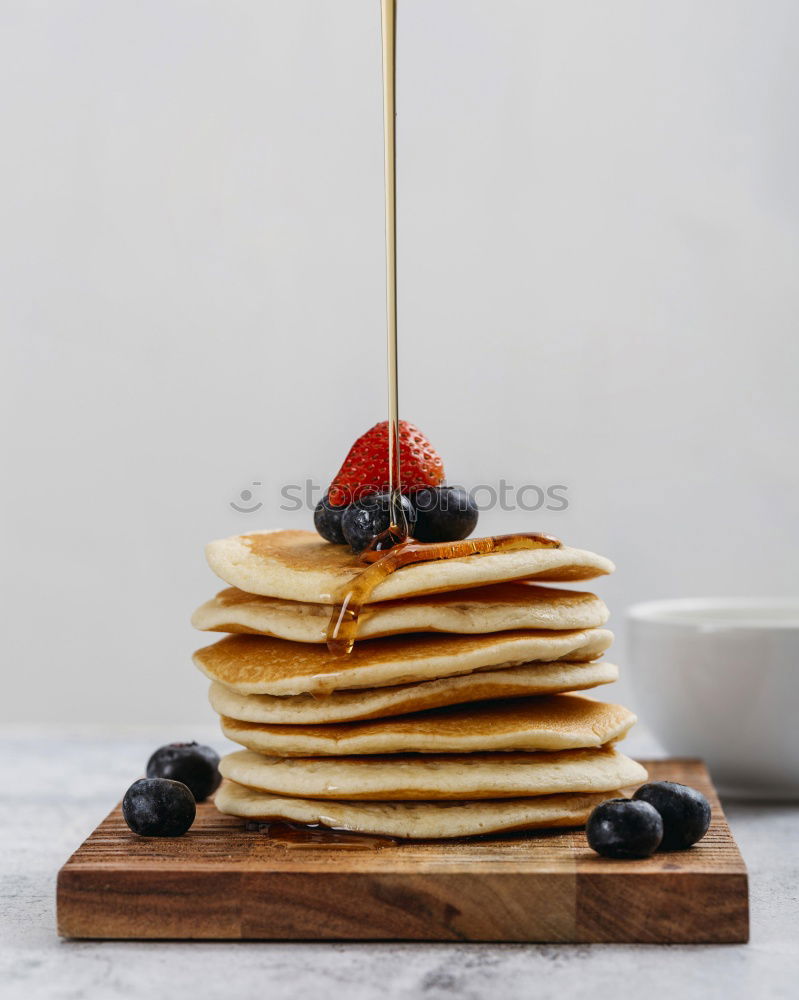 Similar – Image, Stock Photo Pancakes with raspberries and blueberries on white