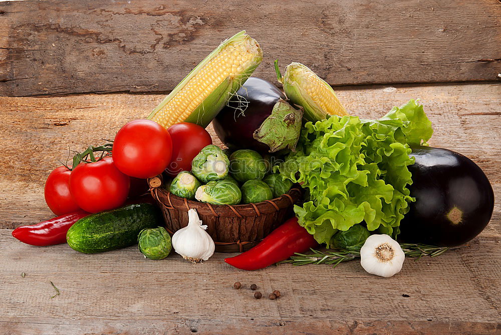 Similar – Vegetables and utensils on kitchen table