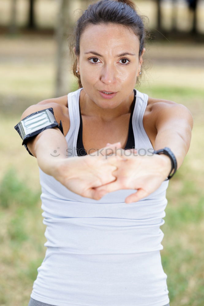 Similar – Black woman using smartwatch touching touchscreen