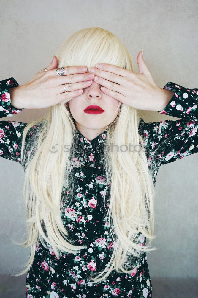 Similar – Young woman with white hair and blackberries in her hands