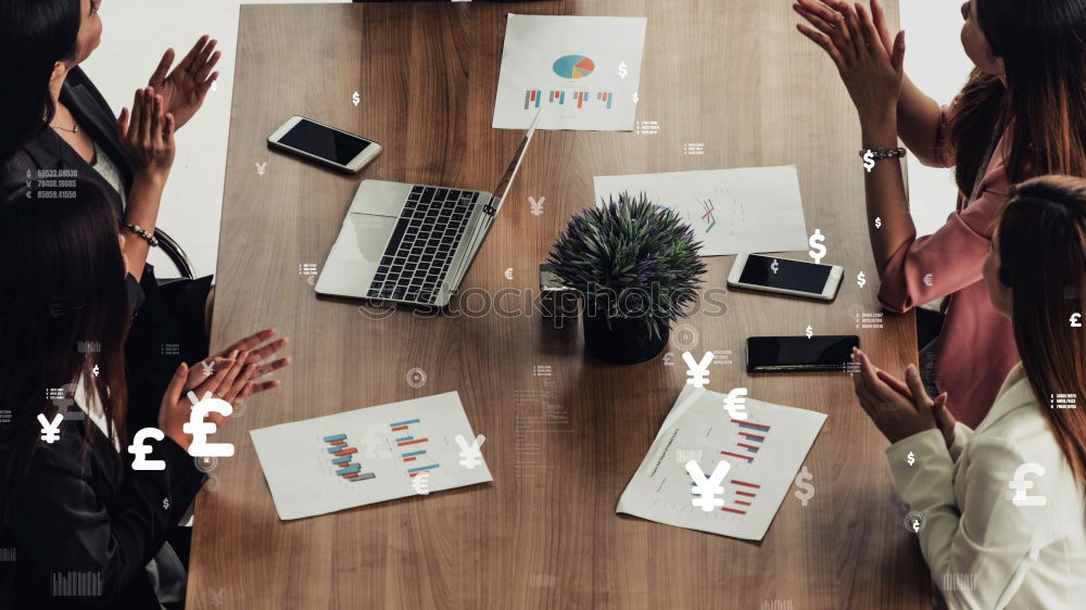 Similar – Group of young adults having a meeting in the office