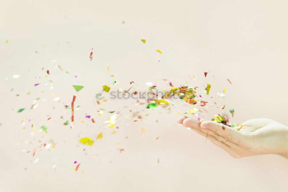 Similar – Black woman with afro hair celebrating with confetti.