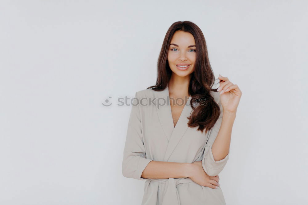 Similar – Image, Stock Photo Beautiful young businesswoman looking at camera.