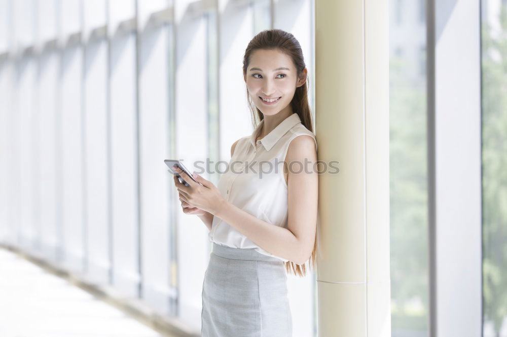 Similar – Young thoughtful woman looking through the window