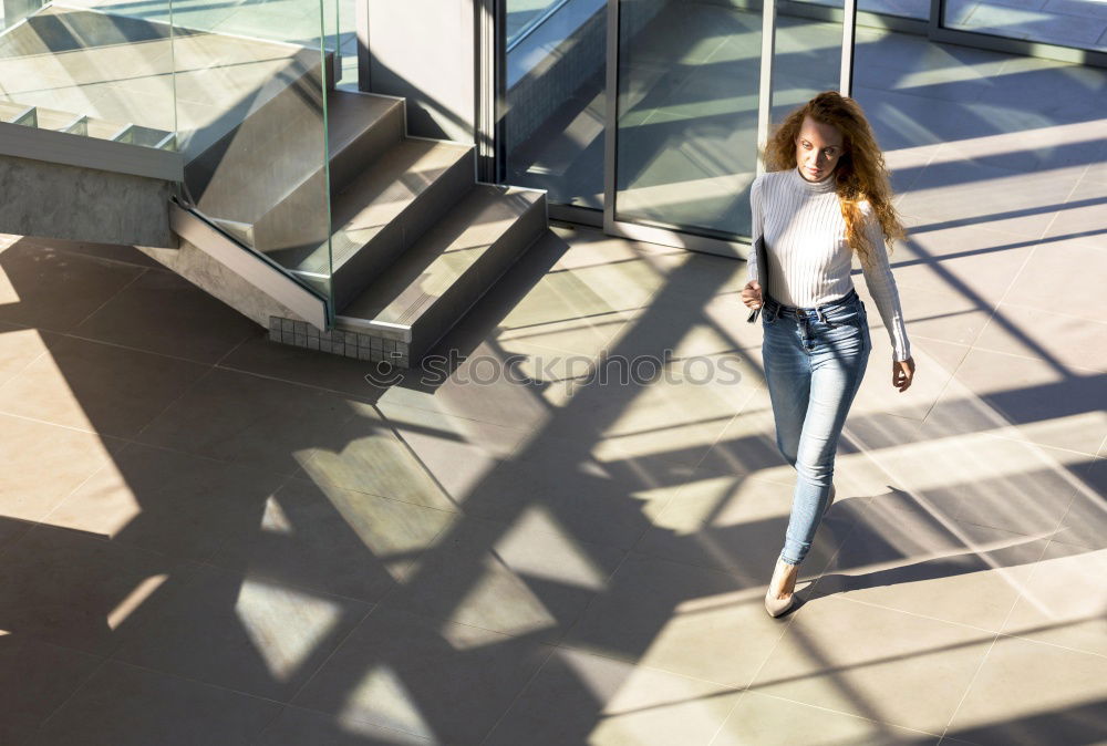 Similar – Image, Stock Photo Cheerful woman standing at handrail