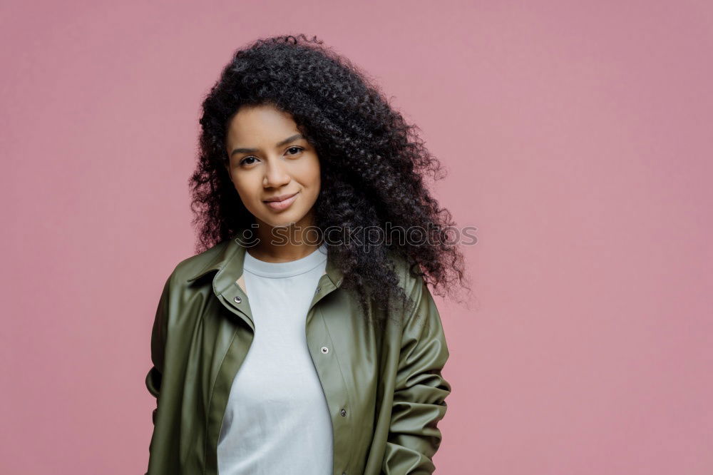 Similar – Image, Stock Photo Mixed woman with afro hairstyle standing in an urban park
