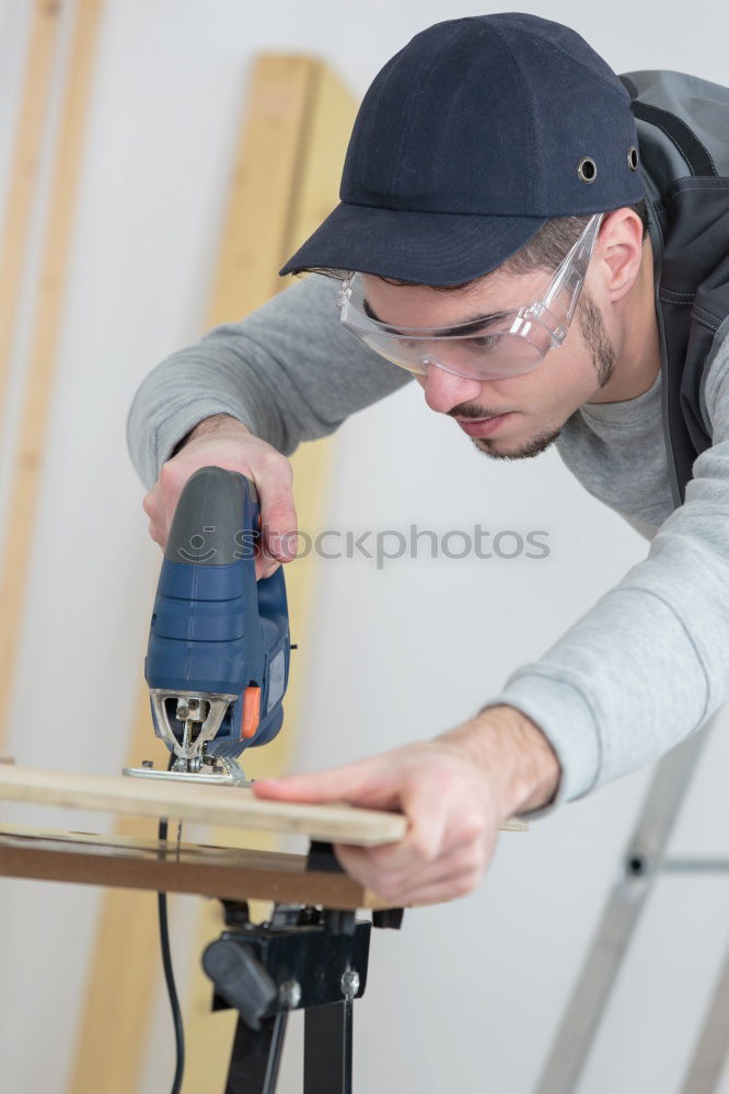Similar – Image, Stock Photo Mechanic in his workshop taking tools