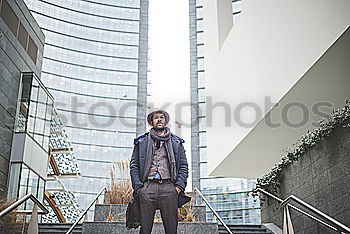 Similar – Stylish executive black man in suit in downtown