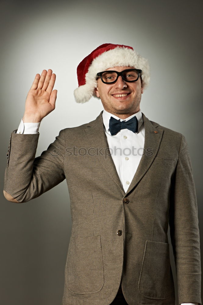 funny man at christmas on black background