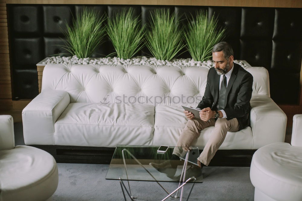 Similar – Image, Stock Photo Woman at home reading in an armchair