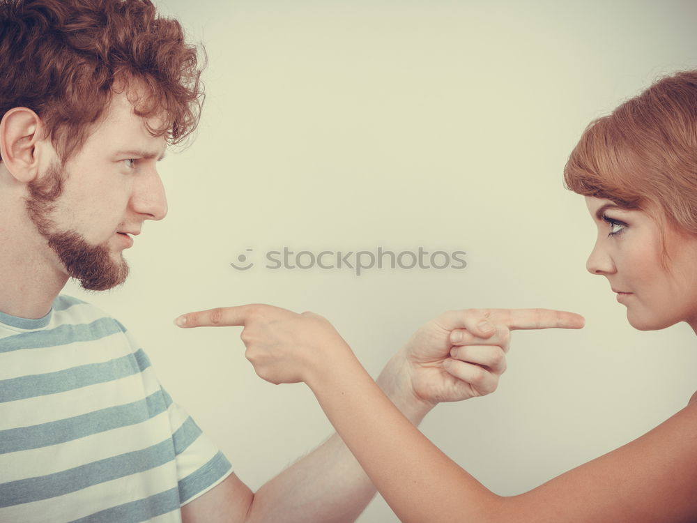 Similar – Portrait of couple of young people arguing