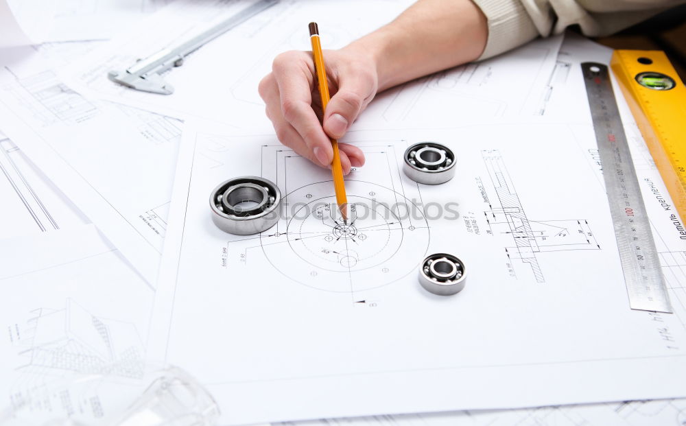 Similar – Image, Stock Photo Architect or planner working on drawings for construction