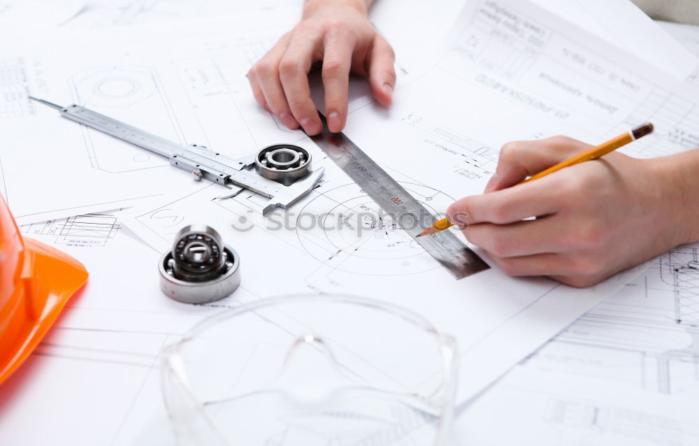 Similar – Image, Stock Photo Architect or planner working on drawings for construction