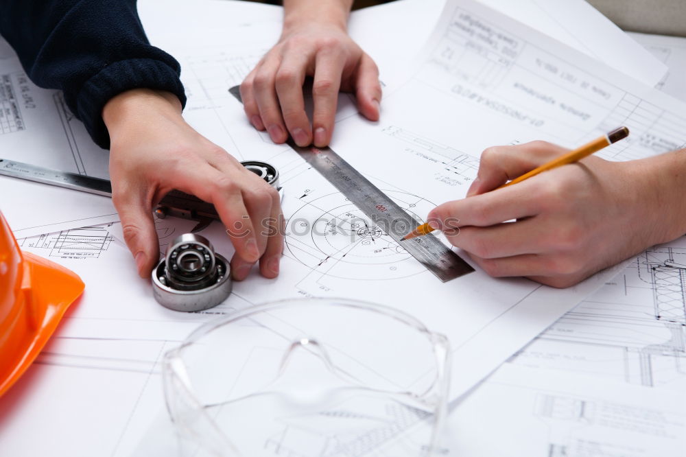 Similar – Image, Stock Photo Architect or planner working on drawings for construction