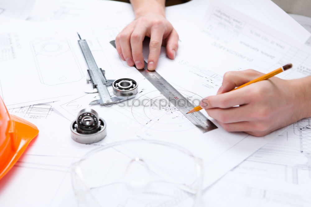 Similar – Image, Stock Photo Architect or planner working on drawings for construction